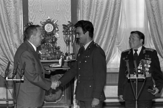 Presenting awards to Soviet-Afghan crew of Soyuz TM-6