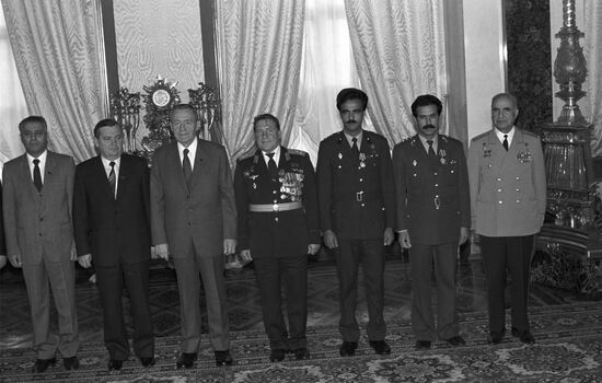 Presenting awards to Soviet-Afghan crew of Soyuz TM-6