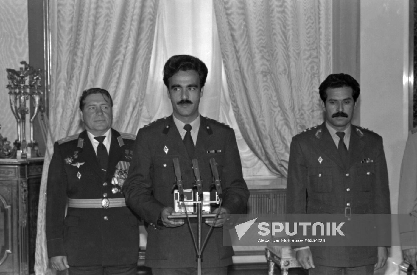 Presenting awards to Soviet-Afghan crew of Soyuz TM-6