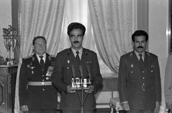 Presenting awards to Soviet-Afghan crew of Soyuz TM-6