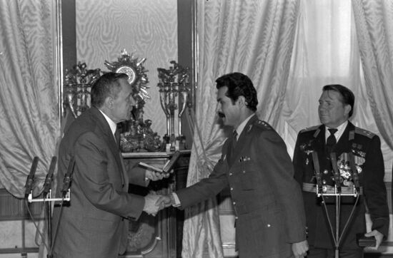 Presenting awards to Soviet-Afghan crew of Soyuz TM-6
