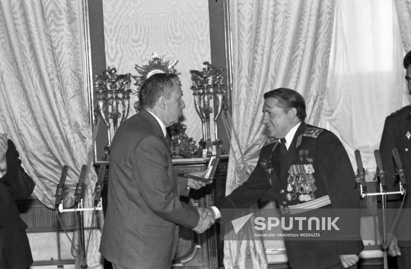 Presenting awards to Soviet-Afghan crew of Soyuz TM-6