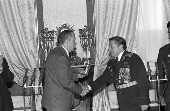 Presenting awards to Soviet-Afghan crew of Soyuz TM-6