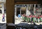 Children are seen at the area damaged by Israeli air strikes during the Israeli-Palestinian conflict, at the town of Beit Hanoun, Gaza Strip, Palestinian Territories. Location: Palestinian Territories, Beit Hanoun. Author: Ahmed Zaqout/Sputnik. Palestine Israel Ceasefire