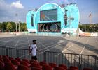 A man wearing a face mask walks at the Euro 2020 fan zone in Luzhniki, in Moscow, Russia. A sign on the T-shirt reads "Vaccinated". The UEFA Euro 2020 fan zone has been opened only for those who can provide QR codes for verifying citizens' COVID-19 status, including vaccination history and PCR results, amid a sharp rise in new coronavirus cases in Moscow region. Location: Russia, Moscow. Author: Pavel Bednyakov/Sputnik. Russia Soccer Euro 2020 Coronavirus Restrictions