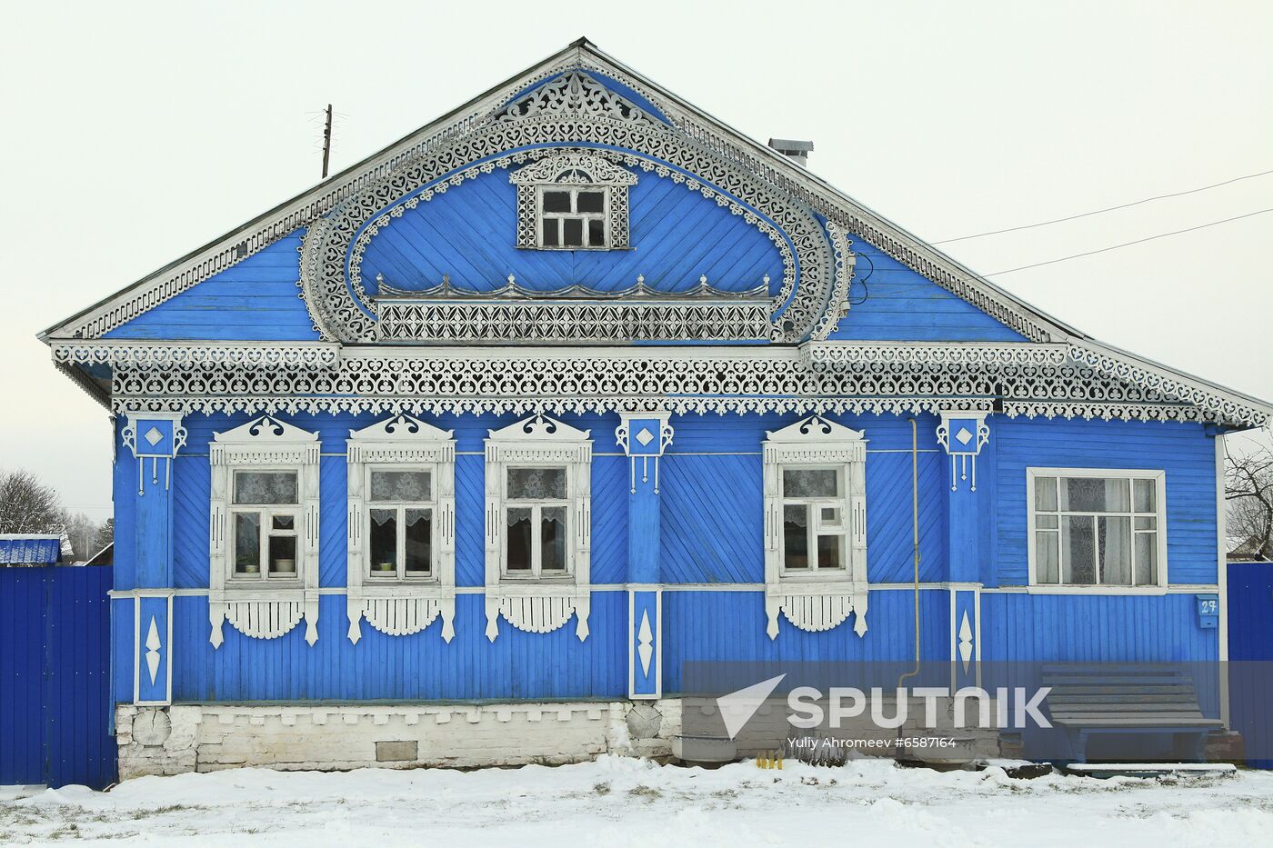 Wooden home with carved decorative elements