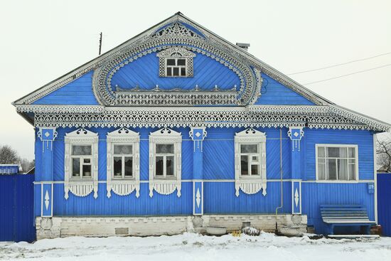Wooden home with carved decorative elements