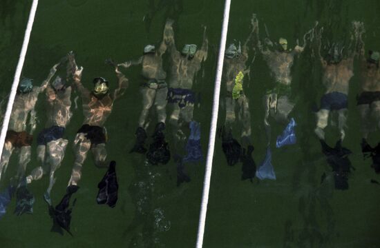 Athletes in swimming pool