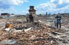 A man stands outside the ruins of a house destroyed by a wildfire in the village of Dzhabyk, in the Chelyabinsk region, Russia. Hundreds of residents were evacuated on Friday as strong winds complicated efforts to control the blaze, which spread across 14,000 hectares (35,000 acres) in the area some 1,500 kilometers (930 miles) east of the capital, Moscow.
Location: Russia, Chelyabinsk Region. Author: Aleksandr Kondratuk/Sputnik. Russia Wildfires
