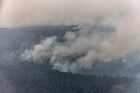 Smoke rises from a wildfire in Gorny District, Russia's Sakha Republic (Yakutia). Region authorities have registered 273 active wildfires in the region, 2161 people and about 300 units of machinery are involved in battling the fires. Location: Russia, Republic of Sakha (Yakutia). Author: Andrey Sorokin/Sputnik. Russia Wildfires