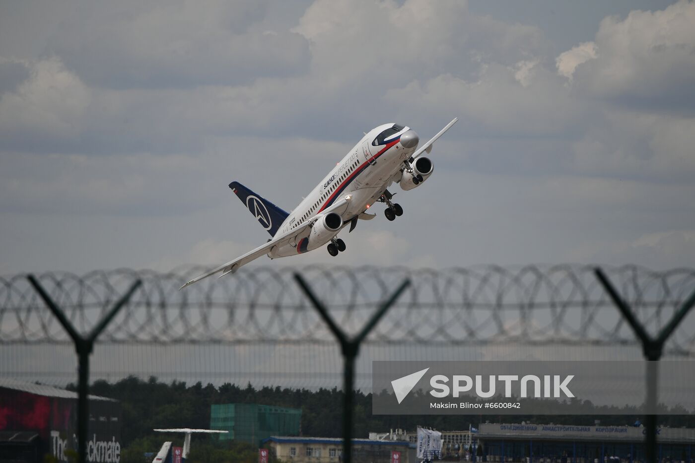 A Sukhoi Superjet 100 airliner performs at the MAKS 2021 International Aviation and Space Salon in Zhukovsky outside Moscow, Russia. Location: Russia, Moscow region, Zhukovsky. Author: Maksim Blinov/Sputnik. Russia MAKS Airshow Flight Program