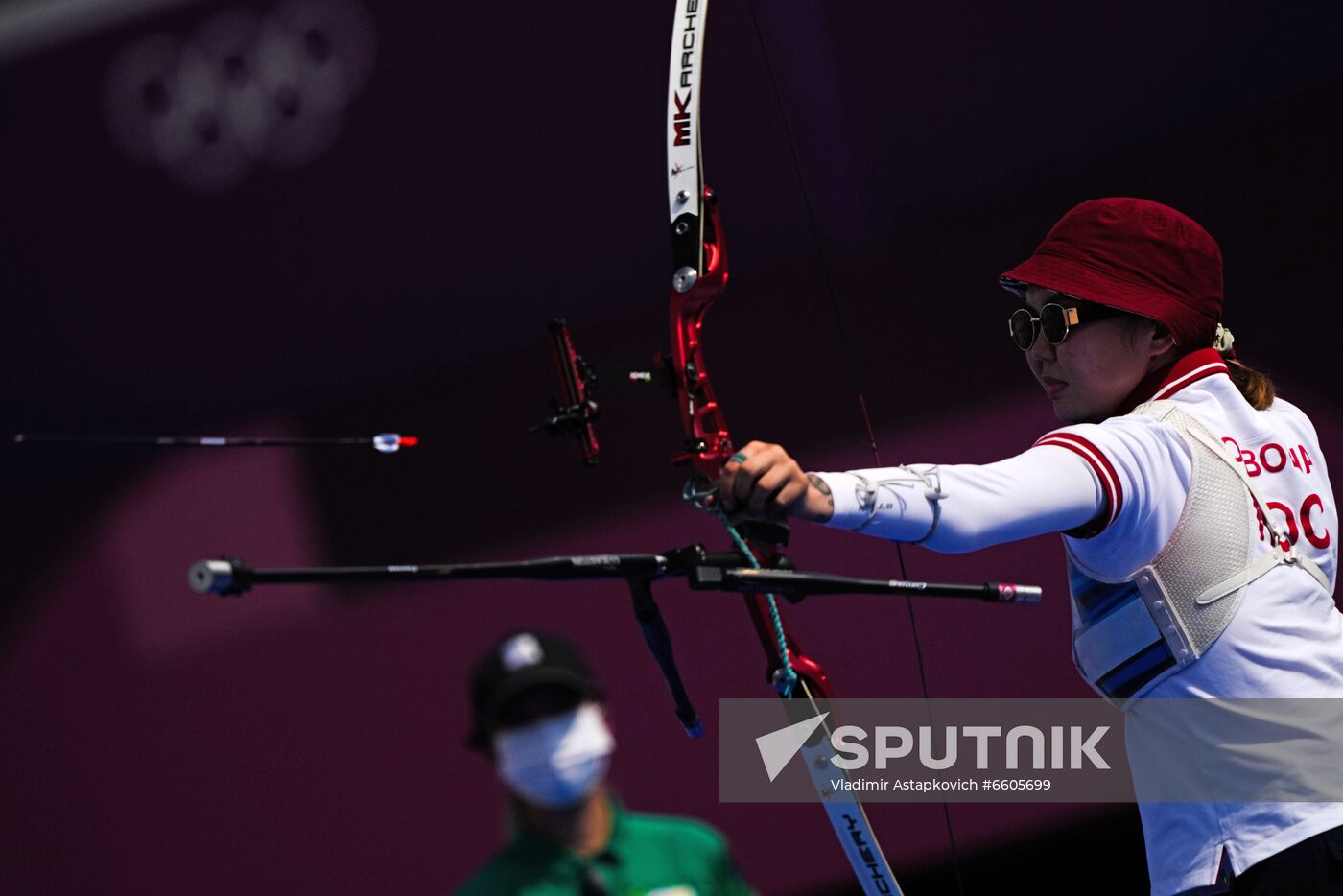 Russian Olympic Committee's Svetlana Gomboeva competes during the archery women's team quarterfinal match between United States and Russian Olympic Committee (ROC) team at the Tokyo 2020 Olympic Games at Yumenoshima Final Field, in Tokyo, Japan. Location: Japan, Tokyo. Author: Vladimir Astapkovich/Sputnik. Japan Olympics 2020 Archery Women Team