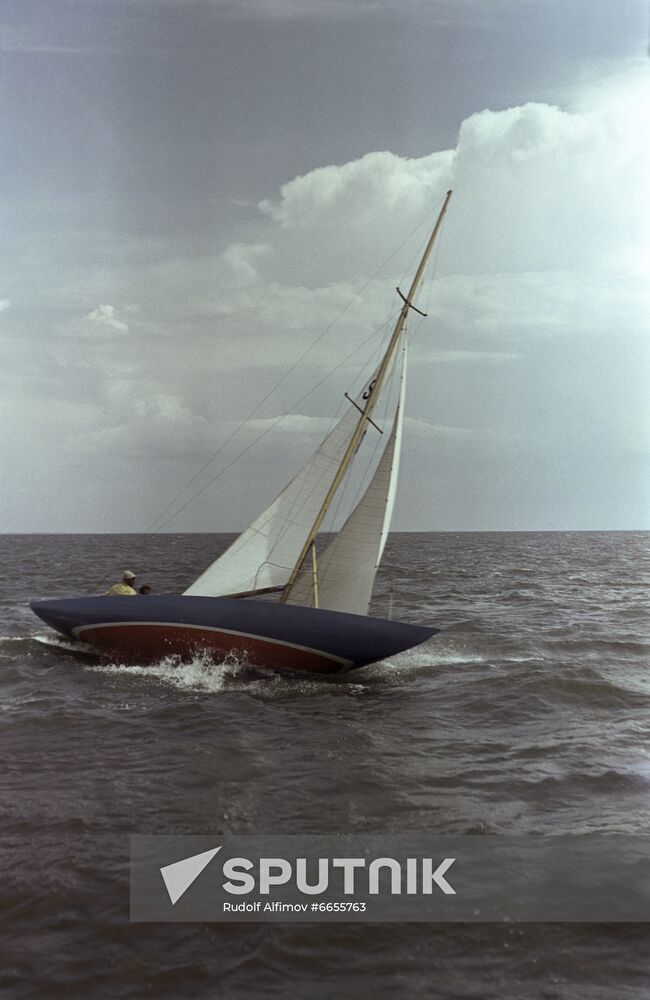 Gaff-sail catamaran in Curonian Lagoon