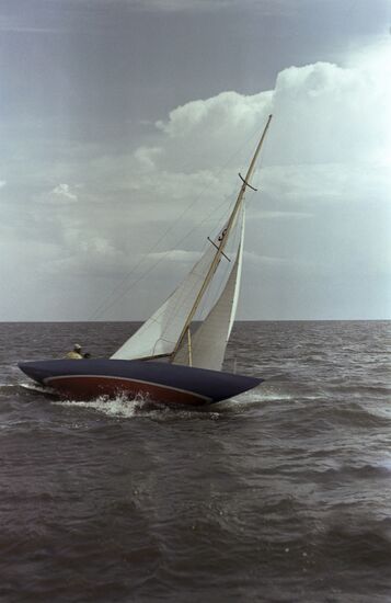 Gaff-sail catamaran in Curonian Lagoon