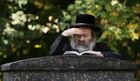 A rabbi prepares for a memorial ceremony for the victims of Babi Yar massacre in Kyiv, Ukraine. Babiy Yar, the large ravine on the northern Kyiv outskirts, is known as the mass killing site where during WWII Nazis executed almost all Jews in Kyiv, many other city residents, prisoners of war and gypsies, with a total number of victims estimated to be more than 100,000 people. Location: Ukraine, Kiev. Author: Stringer/Sputnik. Ukraine WWII Nazi Massacre Babiy Yar Anniversary