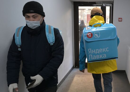 Britain Russia Coronavirus Food Delivery Services