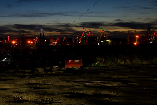 Illuminating cranes at Murmansk seaport
