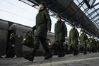 Conscripts for the Russian Army wearing protective face masks prepare to board a train during a send-off ceremony before departing to a place of their service, at the Sevastopol railway station, Crimea, Russia. Location: Sevastopol. Author: Konstantin Mihalchevskiy/Sputnik. Russia Crimea Conscription