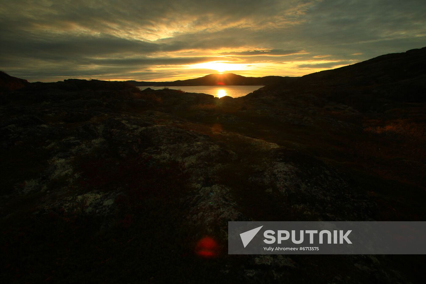 Sunrise in the hills near Teriberka town