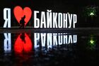 A child walks past a sign reading "I love Baikonur" in Baikonur city, near the Baikonur cosmodrome, Kazakhstan. Location: Kazakhstan, Baikonur. Author: Maksim Blinov/Sputnik. Kazakhstan Daily Life