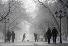 People walk along the Korolyova Avenue on a winter foggy day in Baikonur city, near the Baikonur cosmodrome, Kazakhstan. Location: Kazakhstan, Baikonur. Author: Maksim Blinov/Sputnik. Kazakhstan Daily Life