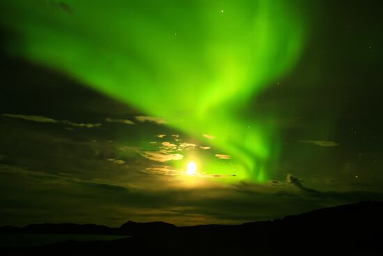 Northern lights over Barents Sea near Teriberka