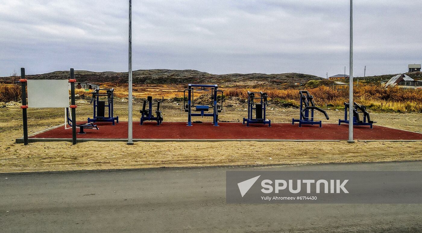 Outdoor sports facility with exercisers in Teriberka town