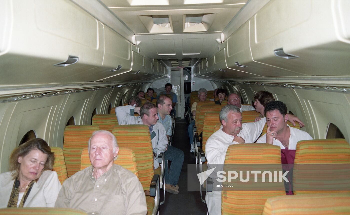 Trip participants with Norwegian seafarer Thor Heyerdahl aboard plane