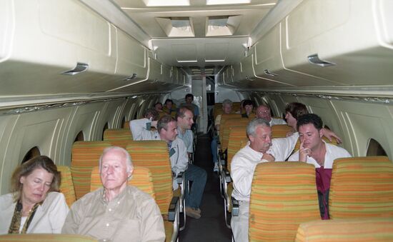Trip participants with Norwegian seafarer Thor Heyerdahl aboard plane