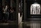 Visitors look the exhibition of famous German-Australian photographer Helmut Newton at the Erarta Museum of Contemporary Art in St. Petersburg, Russia. Location: Russia, St. Petersburg. Author: Alexander Galperin. Russia Art Photography Newton Exhibition