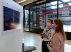 People look at photos displayed during the opening ceremony of the Stenin Photo Contest exhibition at Retiro railway station, in Buenos Aires, Argentina. Andrei Stenin International Photo Contest for young photojournalists is named after special photo correspondent of the Rossiya Segodnya International Information Agency, who was killed while on assignment in the conflict-torn eastern Ukraine. Location: Argentina, Buenos Aires. Author: Ignasio Amikoni/Sputnik. Argentina Stenin Photo Contest