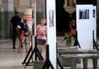 People walk among photos displayed during the opening ceremony of the Stenin Photo Contest exhibition at Retiro railway station, in Buenos Aires, Argentina. Andrei Stenin International Photo Contest for young photojournalists is named after special photo correspondent of the Rossiya Segodnya International Information Agency, who was killed while on assignment in the conflict-torn eastern Ukraine. Location: Argentina, Buenos Aires. Author: Ignasio Amikoni/Sputnik. Argentina Stenin Photo Contest