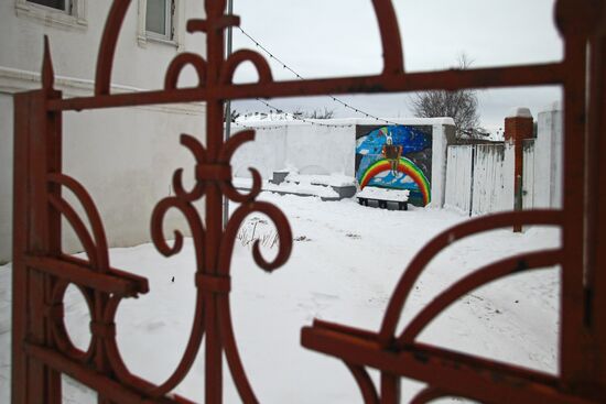 Graffiti in courtyard of arts school in Tarusa