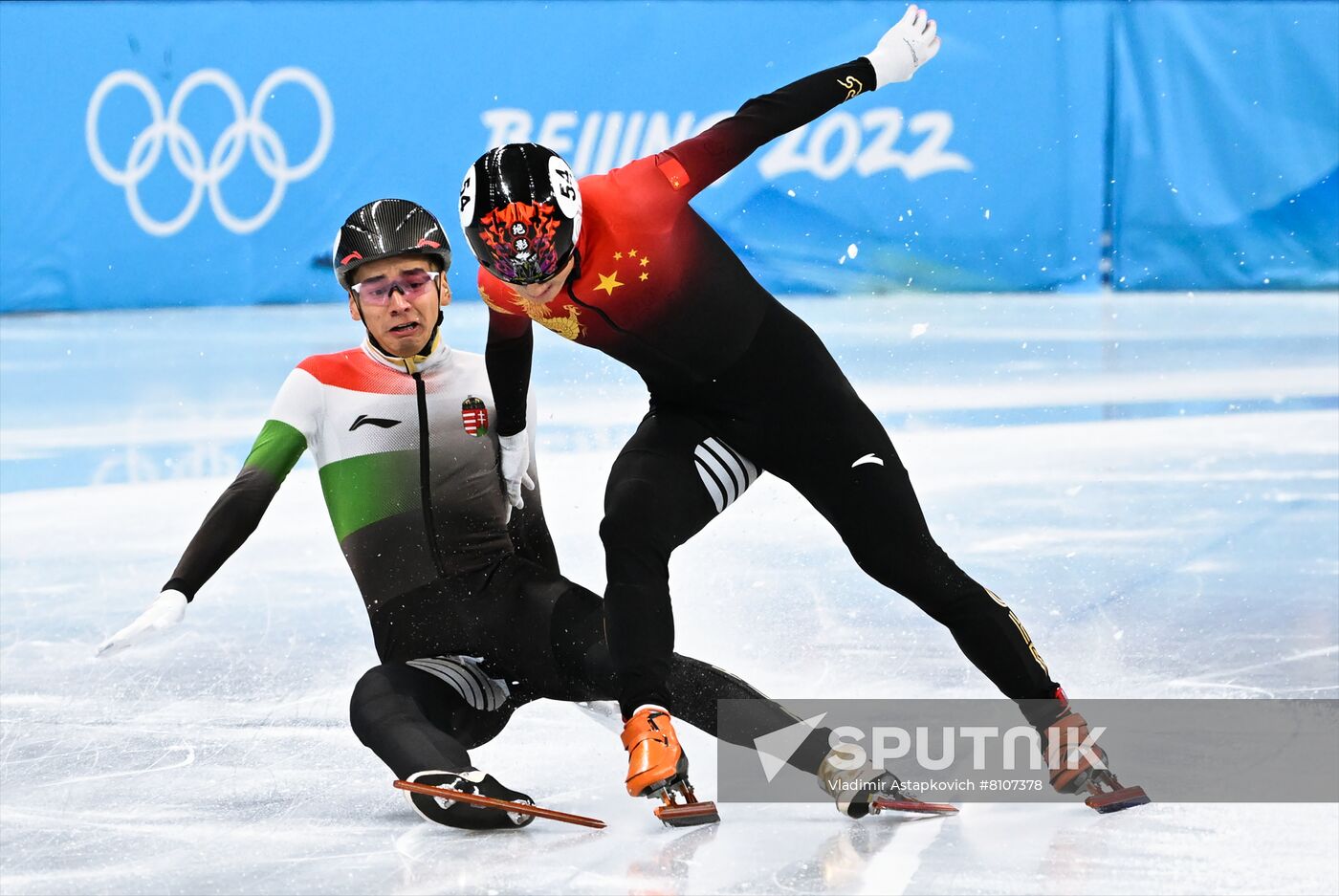 China's Ren Ziwei, right, and Hungary's Shaolin Sandor Liu compete in the short track speed skating men's 1000 m final A during the Beijing 2022 Winter Olympic Games at Capital Indoor Stadium in Beijing, China. Location: China, Beijing. Author: Vladimir Astapkovich/Sputnik. China Olympics 2022 Short Track Speed Skating