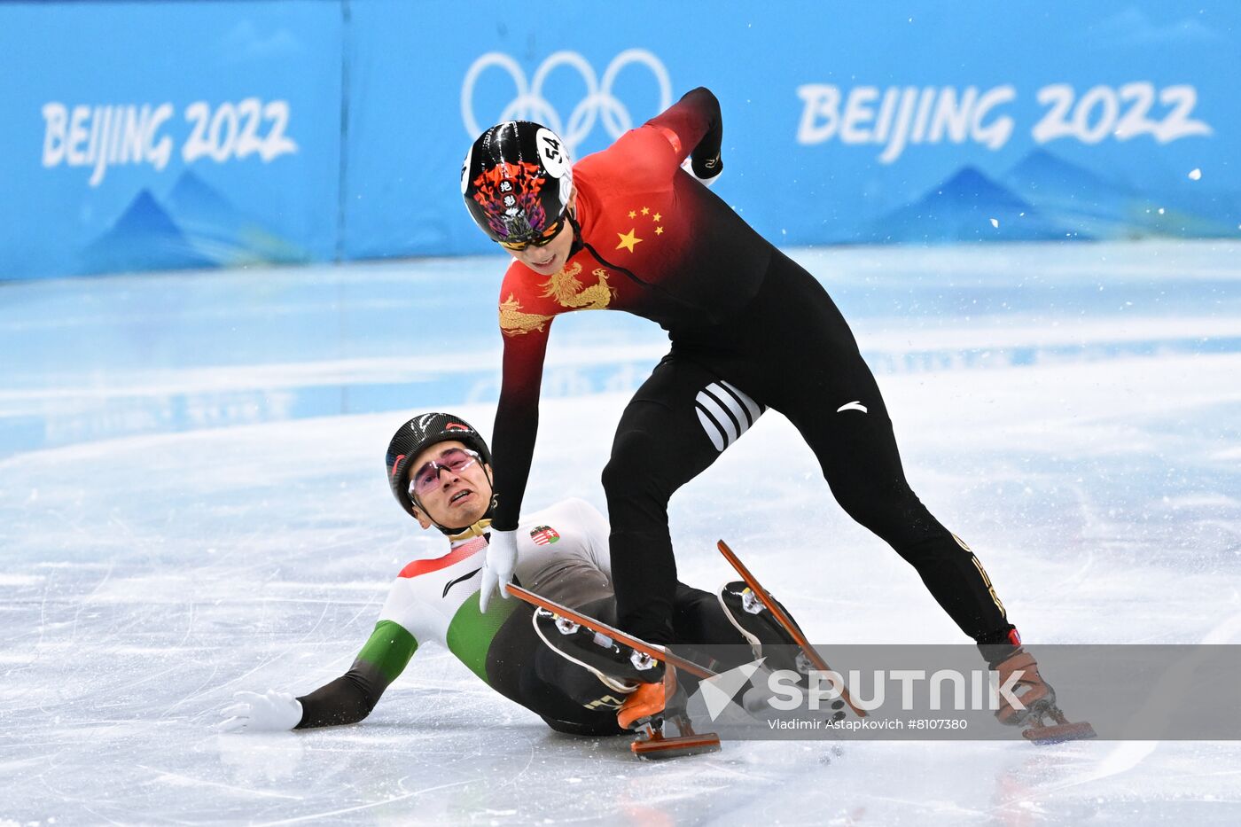China's Ren Ziwei, right, and Hungary's Shaolin Sandor Liu compete in the short track speed skating men's 1000 m final A during the Beijing 2022 Winter Olympic Games at Capital Indoor Stadium in Beijing, China. Location: China, Beijing. Author: Vladimir Astapkovich/Sputnik. China Olympics 2022 Short Track Speed Skating
