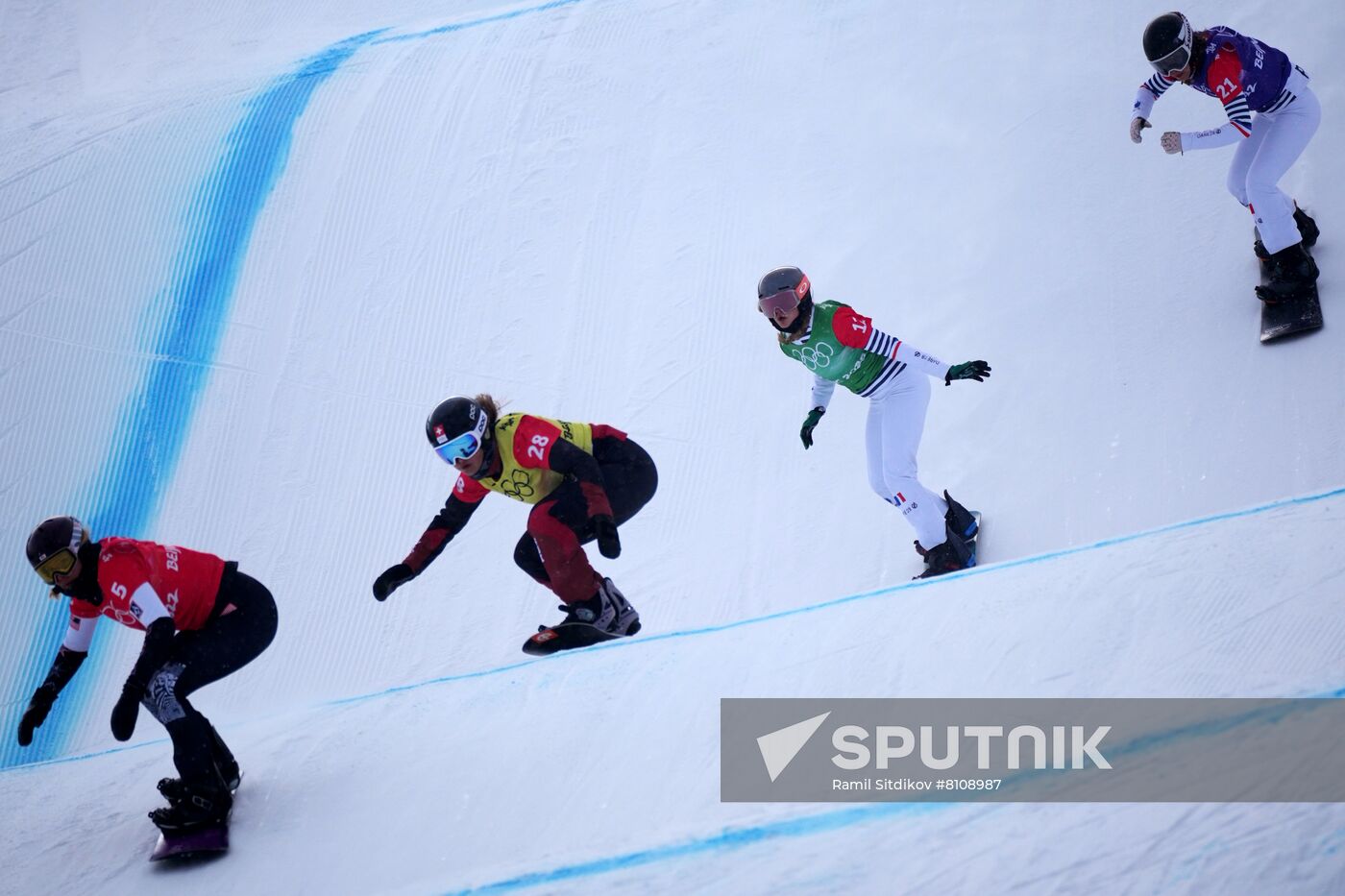 From left, Lindsey Jacobellis, of the United States, Switzerland's Sina Siegenthaler, France's Manon Petit Lenoir and France's Alexia Queyrel compete in the women's snowboard cross 1/8 finals during the Beijing 2022 Winter Olympic Games at Genting Snow Park H & S Stadium in Zhangjiakou, China. Location: China, Zhangjiakou. Author: Ramil Sitdikov/Sputnik. China Olympics 2022 Snowboard Women