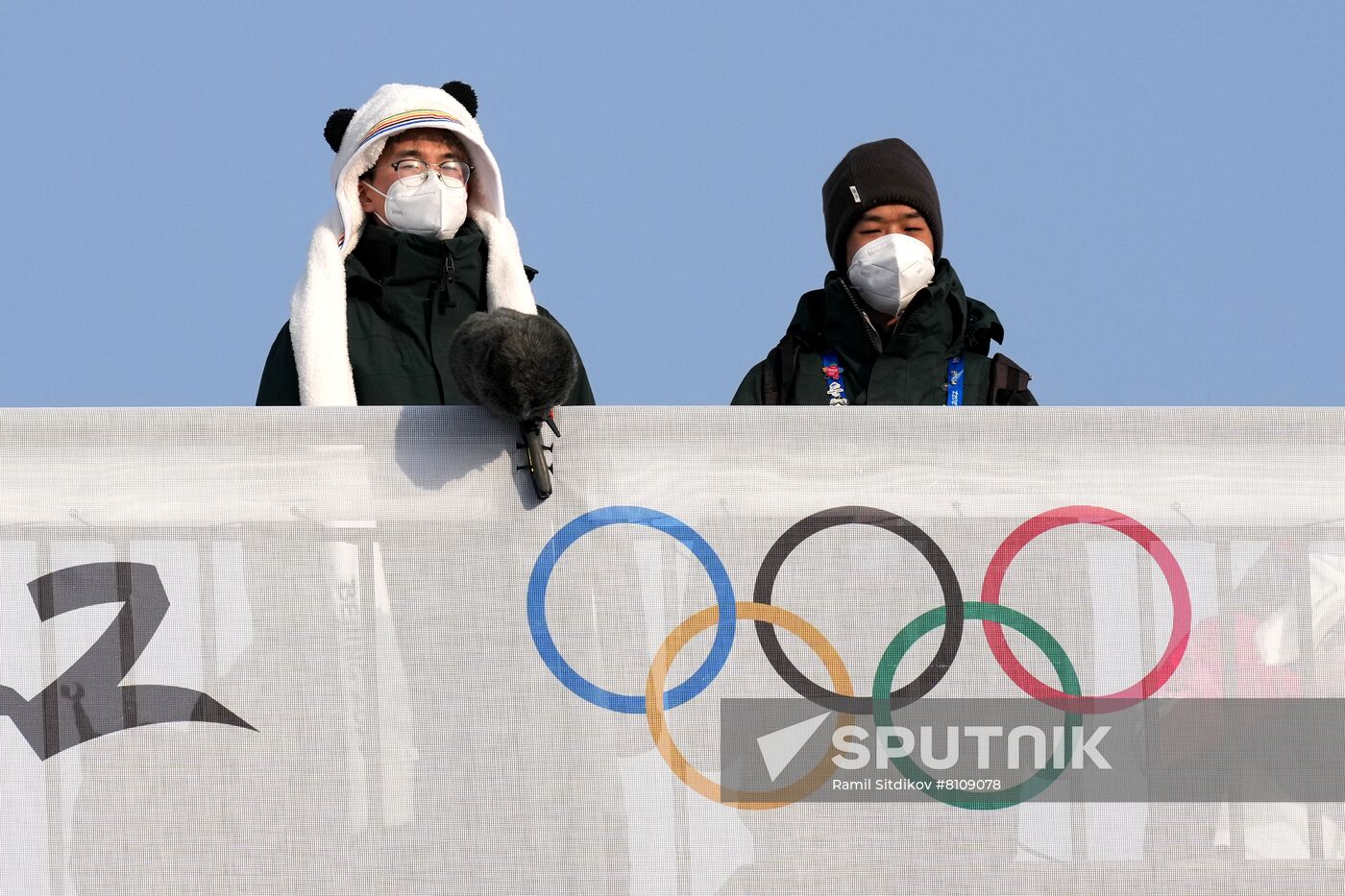 Journalists are seen during a flower ceremony for the women's snowboard cross final during the Beijing 2022 Winter Olympic Games at Genting Snow Park H & S Stadium in Zhangjiakou, China. Location: China, Zhangjiakou. Author: Ramil Sitdikov/Sputnik. China Olympics 2022 Snowboard Women