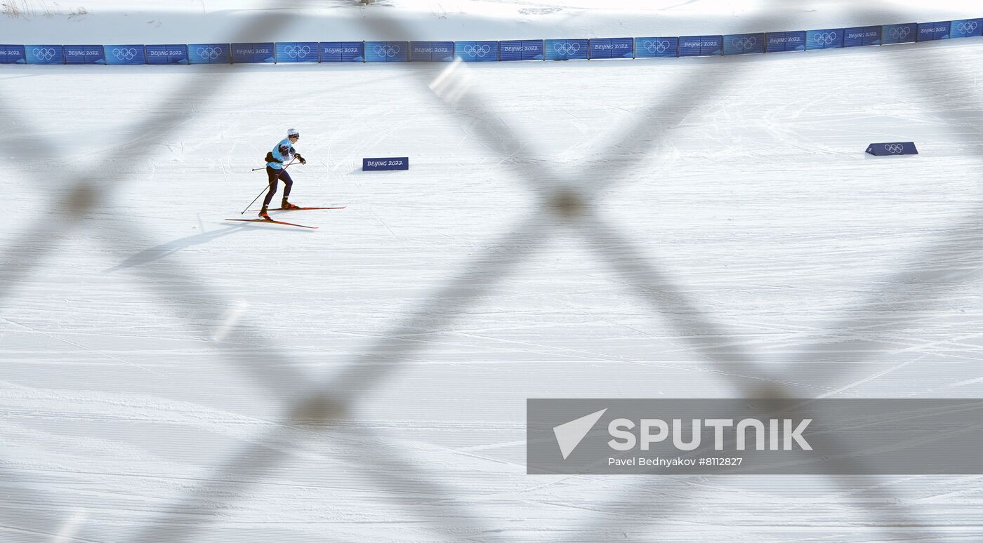 An athlete is seen ahead of the women's cross-country 4x5 km relay event during the Beijing 2022 Winter Olympic Games at the National Cross-Country Skiing Centre in Zhangjiakou, China. Location: China, Zhangjiakou. Author: Pavel Bednyakov/Sputnik. China Olympics 2022 Cross-Country Skiing Women