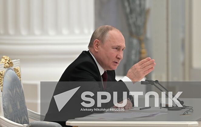 Russian President Vladimir Putin chairs a meeting with members of the Security Council, in Moscow, Russia. Location: Russia, Moscow. Author: Aleksey Nikolskyi/Sputnik. Russia Putin Security Council