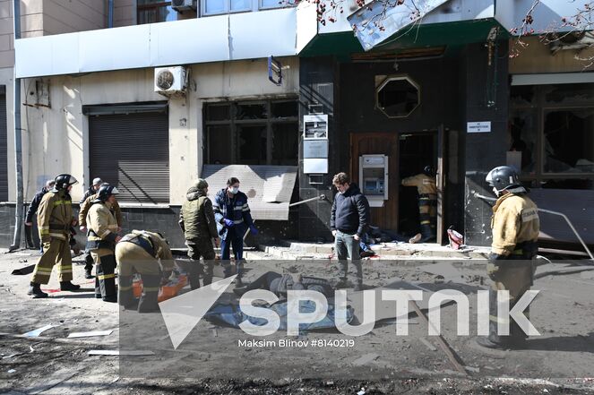 Bodies of killed residents lie in the street after a Ukrainian Tochka-U missile had been shot down near the Government House in the city center in Donetsk, Donetsk People's Republic. The Donetsk authorities reported, according to preliminary data, 20 people died and nine were injured. Location: Donetsk People's Republic, Donetsk. Author: Maksim Blinov/Sputnik. DPR Shelling Aftermath