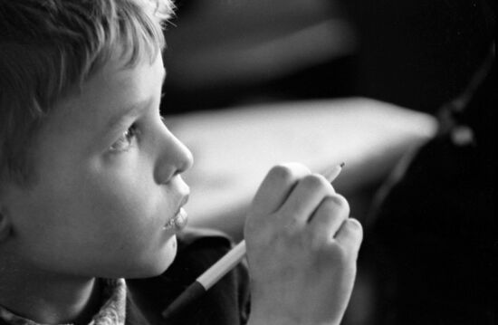 Secondary school student attends lesson