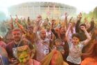 Participants covered with colored powder take part in the 2022 Color Run, a 5 km run around the Luzhniki Olympic Complex in Moscow, Russia. Location: Russia, Moscow. Author: Kirill Kallinikov. Russia Color Run