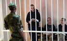 British citizens Aiden Aslin and Shaun Pinner, and citizen of Morocco Saadun Brahim, surrounded by Russian forces after they went to fight in Ukraine and accused of being a foreign mercenaries, sit inside a defendants' cage as they attend a court hearing in Donetsk, Donetsk People's Republic. According to General Prosecutor's Office of the Donetsk Peoples Republic, three foreigners may be sentenced to an exceptional measure - the death penalty. Location: Donetsk People's Republic, Donetsk. Author: Konstantin Mihalchevskiy/Sputnik. DPR Russia Ukraine Military Operation Captured Soldiers Trial