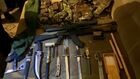 In this handout video grab released by the Russian Federal Security Service (FSB), weapons and ammunition seized by FSB officers are seen during detention a supporter of the Hayat Tahrir al-Sham terrorist group (banned in Russia), who planned to commit a terrorist act against law-enforcement officers in the Trans-Baikal Territory, in Chita, Russia. Editorial use only, no archive, no commercial use. Location: Russia, Chita. Russia Terrorist Detention