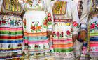 Mari women take part in the annual Agavairem celebration to mark the end of the sowing season in the Pine Grove of Yoshkar-Ola, El Mari Republic, Russia. On that day Mari pray for a plentiful harvest to the Great God Yumo who is being revered as Agavairem, which means both deity of creative energy and the feast marking the end of spring sowing works. Location: Russia, Republic of Mari El, Ioshkar-Ola. Author: Alexey Filippov/Sputnik. Russia Traditional Mari Celebration