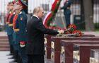 Russian President Vladimir Putin lays flowers at the Hero Cities memorial plates during a ceremony held on the Remembrance and Sorrow Day to mark the 81st anniversary of the Nazi German invasion into Soviet Union, by the Kremlin wall in Moscow, Russia. Location: Russia, Moscow. Author: Mikhail Metzel/Sputnik. Russia Putin WWII Remembrance and Sorrow Day