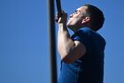A participant demonstrates his skills during a firefighters competition at the Moscow Fire and Rescue Service's training center in the village of Aparinki, Moscow region, Russia. Location: Russia, Moscow region. Author: Pavel Bednyakov/Sputnik. Russia Firefighters Contest