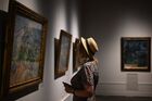 A visitor explores painting "Montagne Sainte-Victoire" by Paul Cezanne at the exhibition "Brother Ivan - The Collections of Mikhail and Ivan Morozov" at the Pushkin State Museum of Fine Arts in Moscow, Russia. The exhibition contains a total of more than 600 items, including those of applied arts, books, photographs, archival materials, and some 260 paintings, sculptures and works of visual art. Location: Moscow. Author: Vladimir Astapkovich/Sputnik. Russia Art Morozov Collection