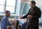 A priest distributes icons of St. Luke during a visit by representatives of the Simferopol and Crimean dioceses to wounded soldiers and officers in the course of Russia's military operation in Ukraine who are treated at the Pirogov hospital of the Russian Defence Ministry in Simferopol, Crimea, Russia. Location: Russia, Republic of Crimea, Simferopol. Author: Dmitry Makeev/Sputnik. Russia Ukraine Military Operation