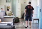 A Russian servisemen wounded during Russia's Military Operation in Ukraine walks along the corridor of the Pirogov hospital of the Russian Defence Ministry, in Simferopol, Crimea, Russia. Location: Russia, Republic of Crimea, Simferopol. Author: Dmitry Makeev/Sputnik. Russia Ukraine Military Operation